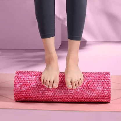 Rouleau de massage rose foncé